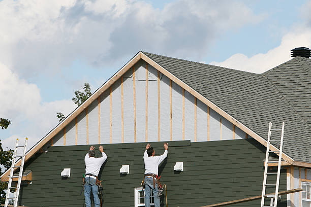 Professional Emergency Siding Repair technician working in Logan, OH